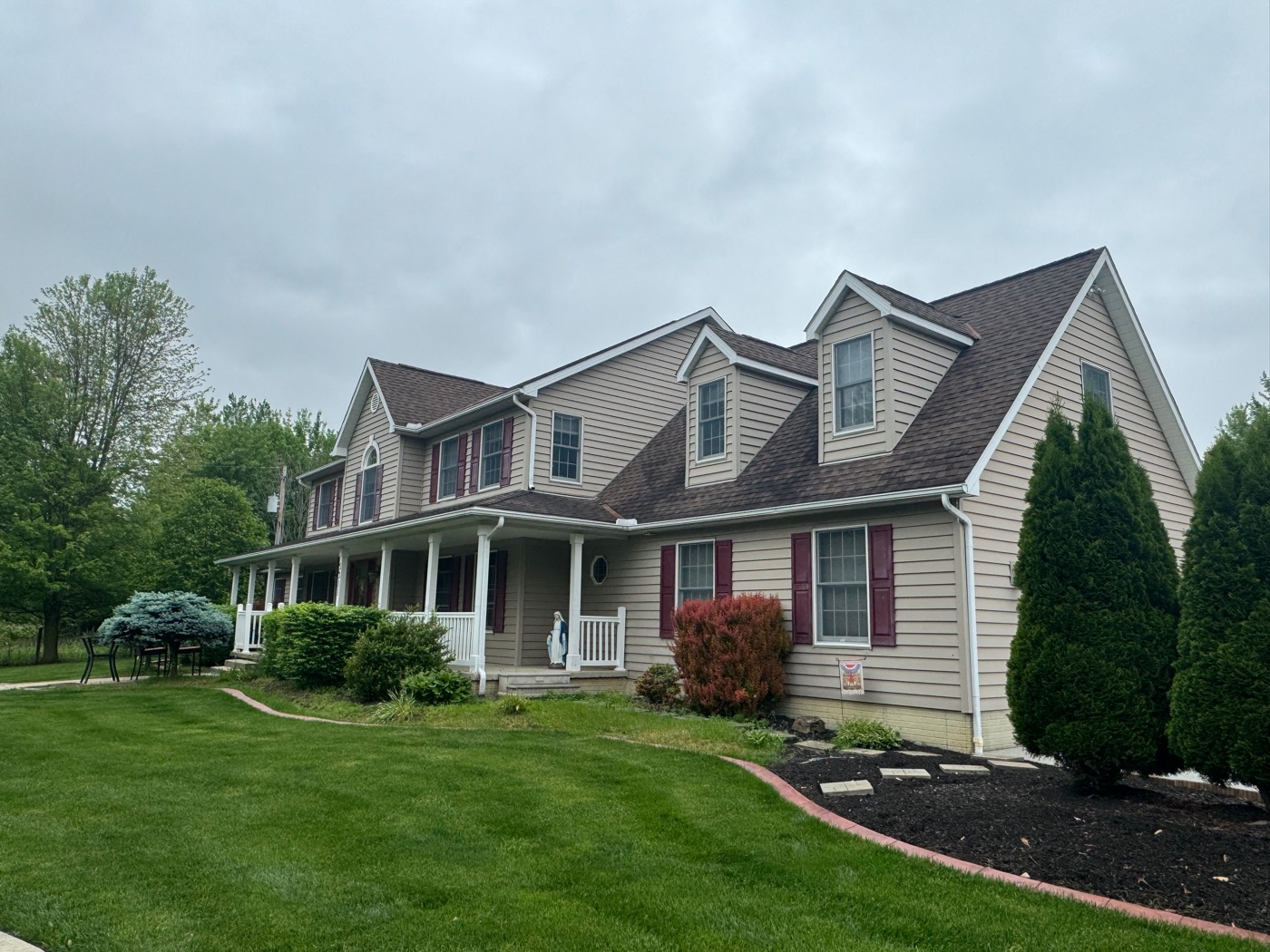 Soft-washed asphalt roof with algae streaks cleared on a Canal Winchester, OH home